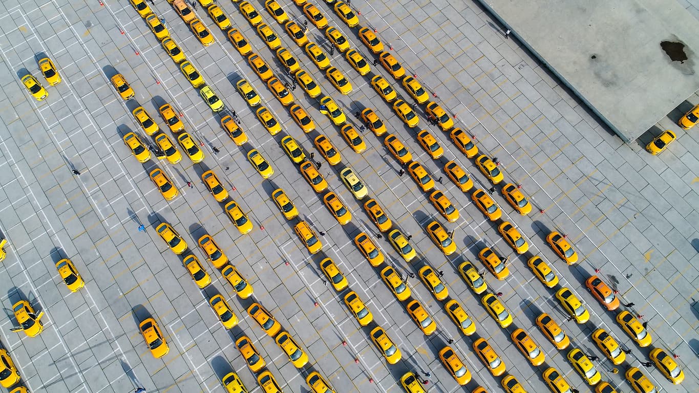 Photo of yellow taxi cabs representing multiple virtual desktops setup through Amazon Workspaces Pools
